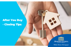 a-hand-holding-a-key-with-a-key-ring-shaped-like-a-house-saying-after-you-buy-closing-tips